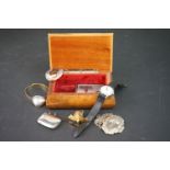 Wooden box containing decanter labels, medieval rings, rolled gold bangle, silver vesta etc