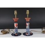 Pair of Moorcroft ' Rose pattern ' Table Lamps in the form of Candlesticks, impressed Moorcroft mark