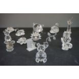 Group of 14 unboxed Swarovski animals, flowers etc, to include bears, mouse, hedgehog, owl, swans