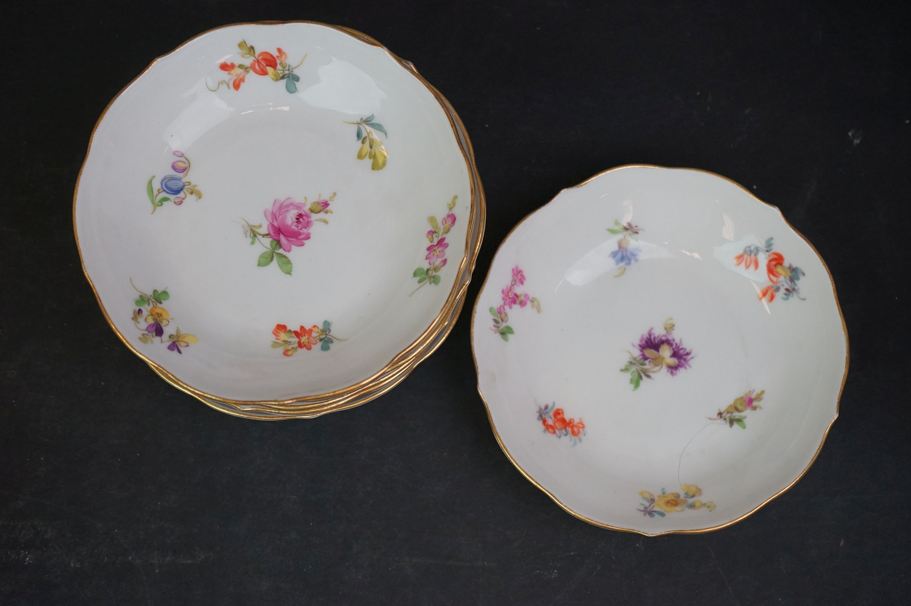 A collection of Meissen and Dresden porcelain to include plates, cups and dishes. - Image 11 of 13