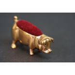 Brass pincushion in the form of a pig