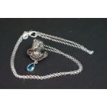 Silver cherub pendant necklace