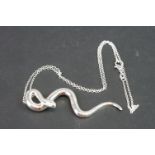 Silver pendant necklace with snake drop