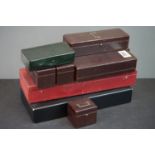 A collection of six Hermes tooled leather cases together with three others.
