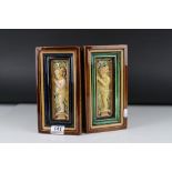 Two Majolica Brick Plaques with moulded relief decoration depicting Cherubs, each 24cms x 13cms