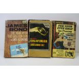 A collection of five vintage pan paperback James Bond 007 books.