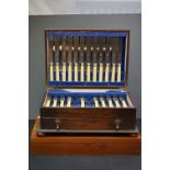 An oak cased mid 20th century Viners Of Sheffield cutlery box containing a matched cutlery set