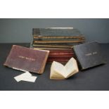 A collection of fishing, hunting and game leather bound registers and journals dating from the early