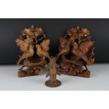 A pair of Black Forest style wall pockets of the form of birds by there nest and a pen stand in