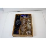Collection of 19 decanter stoppers, seven blue glass cruet liners & a vintage cutlery tray