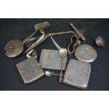 A collection of hallmarked sterling silver items to include three cigarette cases and a compact.