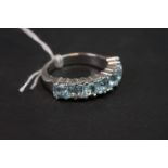 Silver dress ring, set with blue topaz