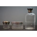 A group of three fully hallmarked sterling silver items to include to powder jars and a scent bottle