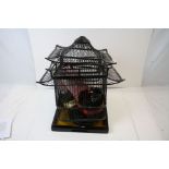 A wooden pagoda bird cage together with a quantity of oriental boxes and stands.