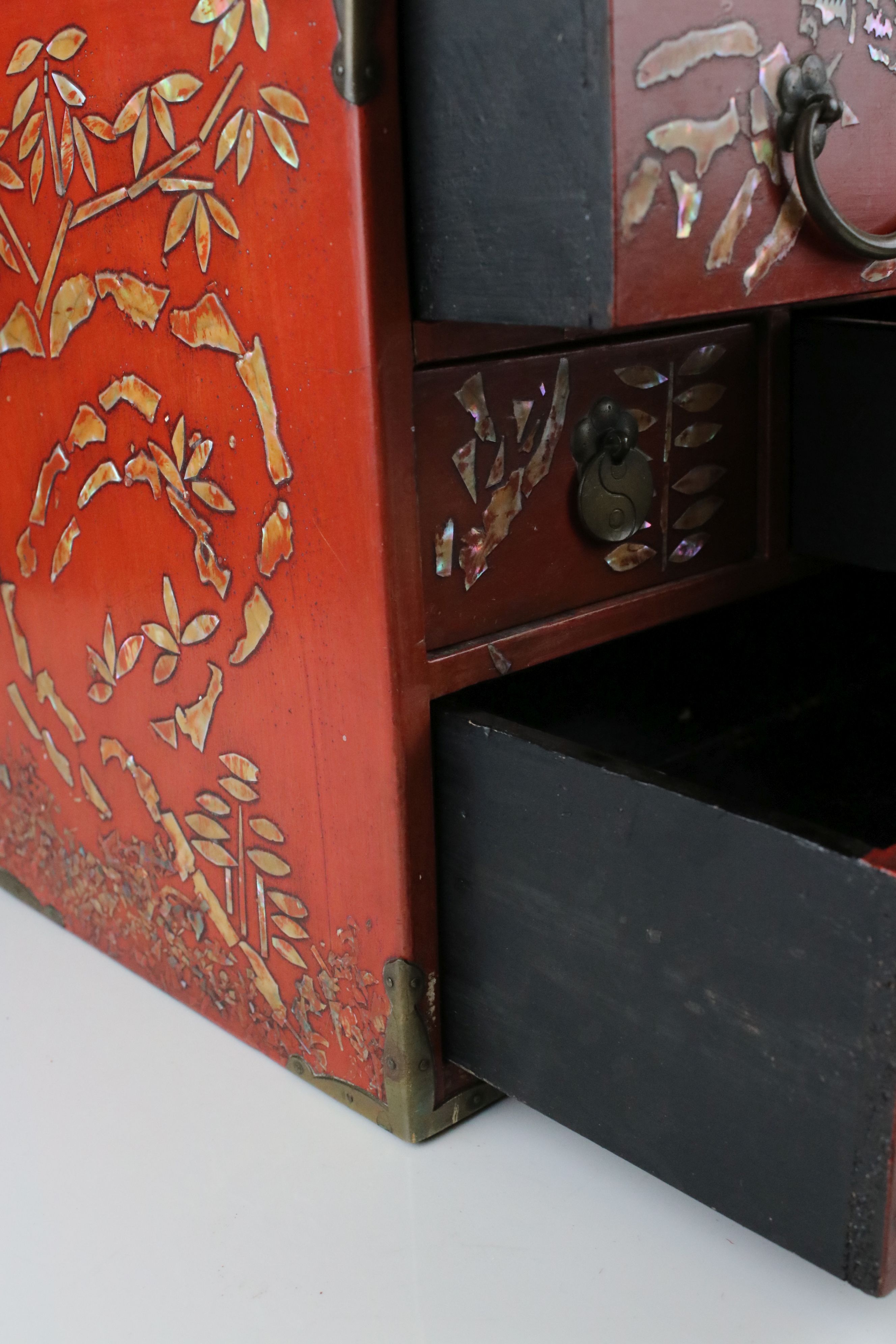 Japanese Red Lacquer and Brass Bound Table Top Cabinet with mother of pearl style decoration, - Image 5 of 7