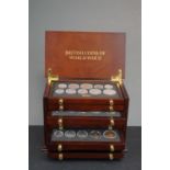 A cased Danbury Mint British coin of world war two collection complete with COA's.