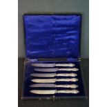 A cased set of six fully hallmarked sterling silver handled fruit knives.