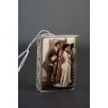 Silver plated and enamel vesta case depicting a gentleman and a nude lady