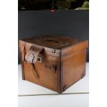 An antique W H Smith early 20th century leather traveling hat box/vanity case with lift out free