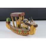 A Folk art painted Egyptian style ship with figures. 22 cm long x 13 cm tall.