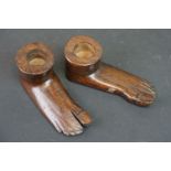 Hand carved Treen candlesticks, in the form of feet