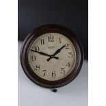 A Bakelite 8 day mid 20th century Smiths wall clock possibly school or office with Platform