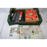 A collection of British and World stamps to include loose and hinged examples.