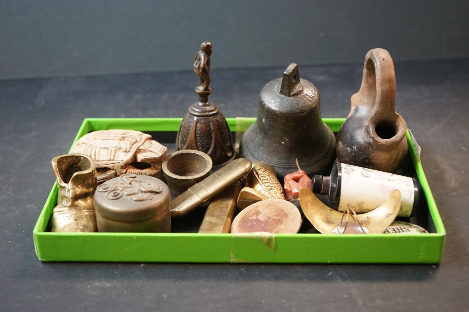 A group of mixed collectables to include a carved horn elephant suff box, a brass match holder and a