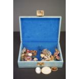 A large collection of 37 mainly vintage costume jewellery pin brooches contained within a vintage