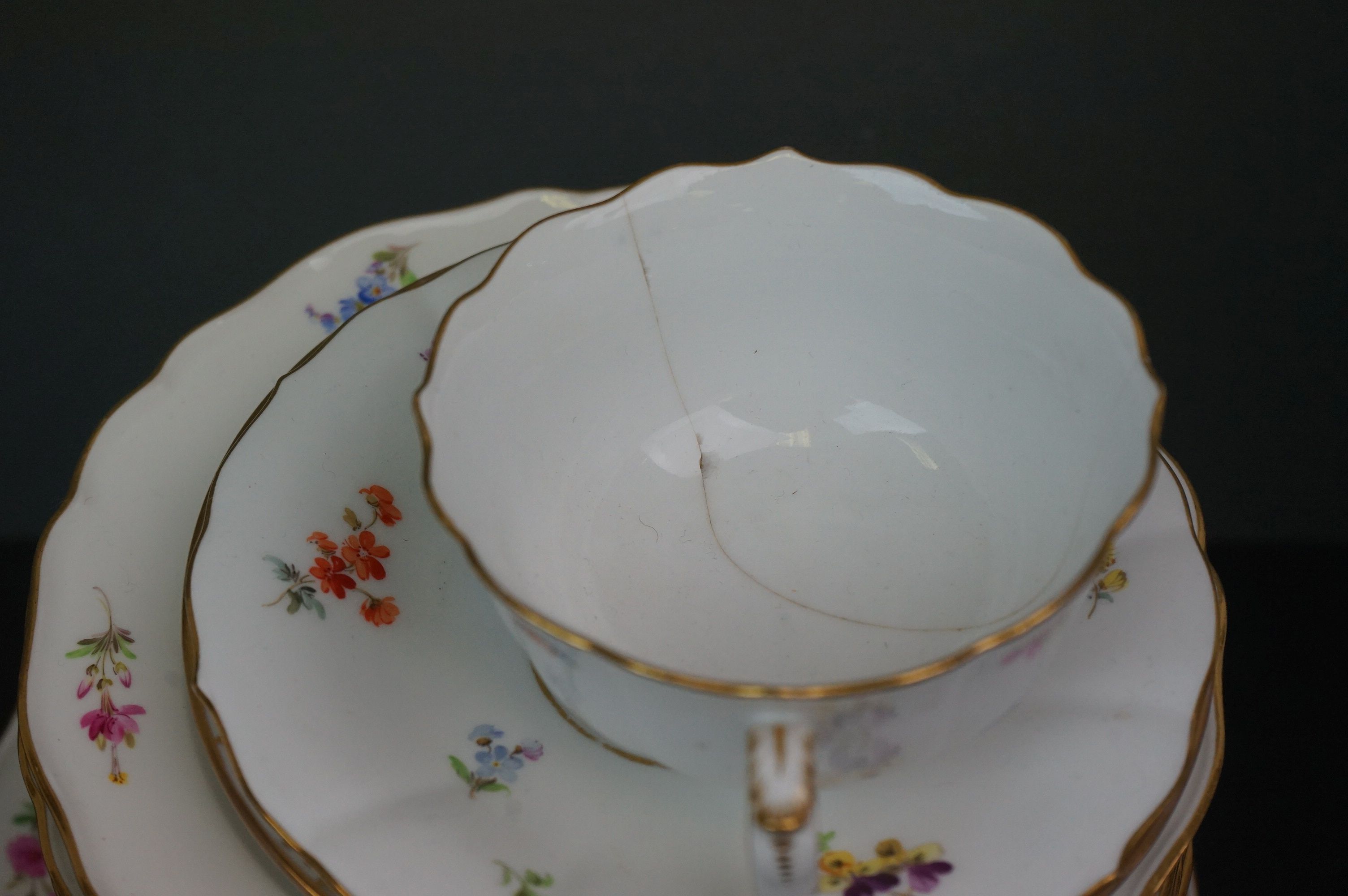 A collection of Meissen and Dresden porcelain to include plates, cups and dishes. - Image 6 of 13