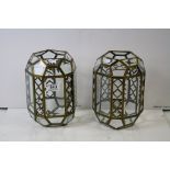 Two gilt metal and bevelled glass ceiling lamp shades.