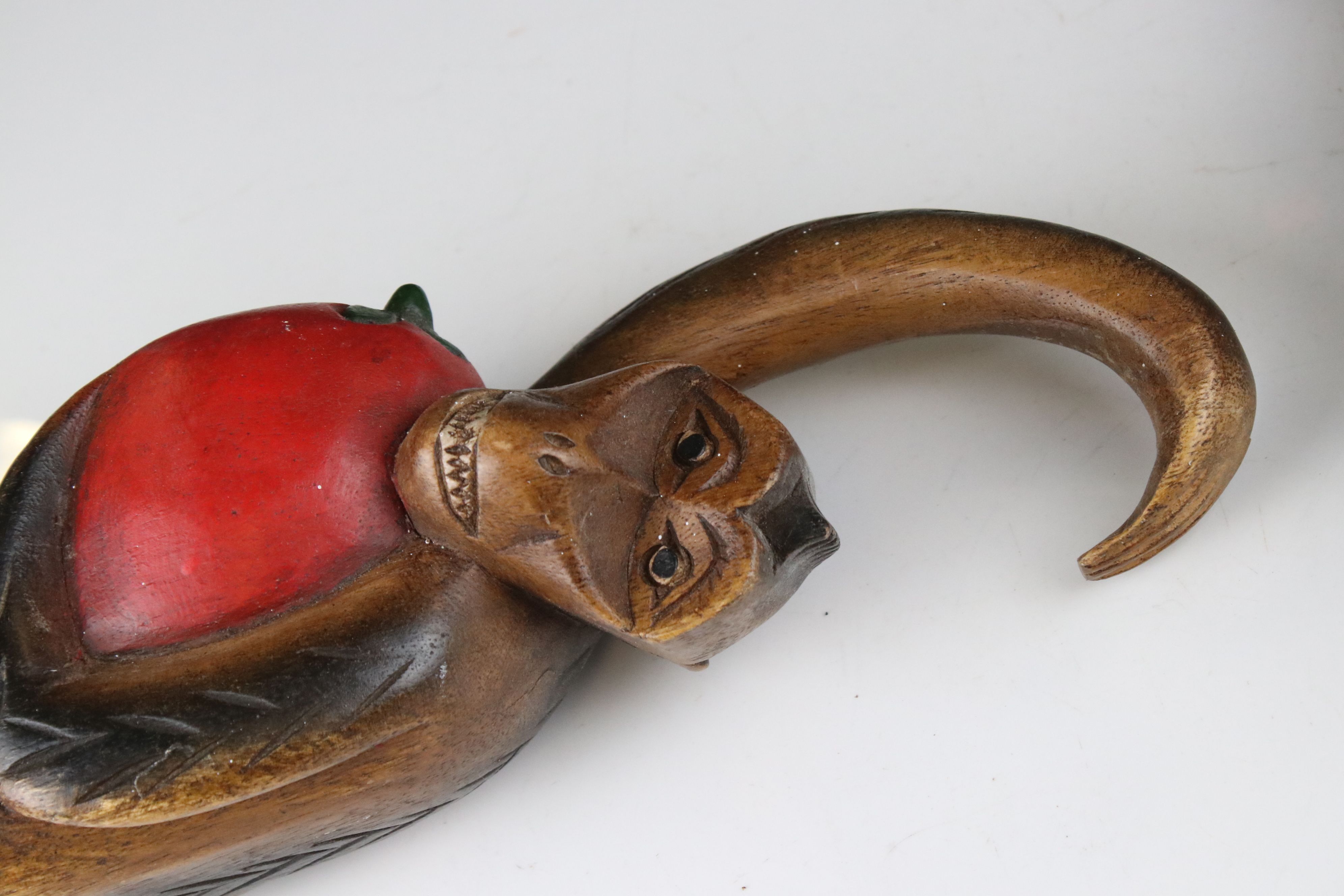 Three Carved Wooden Hanging Monkeys holding Fruit, largest 36cms high - Image 3 of 6