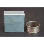 A fully hallmarked sterling silver napkin ring in original box.