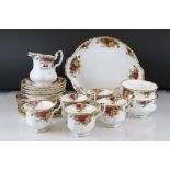 A Country Roses Royal Albert part tea set to include trios, jug , bowl, cake plate etc.