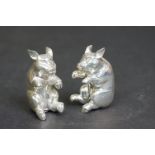 Pair of silver plated piglet condiments