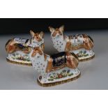 Three Royal Crown Derby limited edition paperweights in the form of the Queens Corgi dogs.