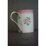 19th century Pearlware Mug painted with floral sprays and with twisted handle, 12cms high