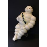 A mid 20th century Michelin Man advertising figure on metal stand 46 cm tall.