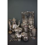 A collection of silver plate to include teapots, coffee pots, goblets and a cream jug.