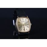 A 18ct gold cased gents Baume & Mercier Baumatic watch with date marker to 6pm.