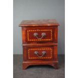 Small inlaid chest of drawers