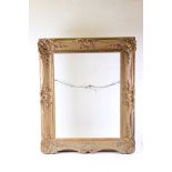 A Louis XV style giltwood picture frame to take a canvas 51 x 66cm, bearing trade label of Robert