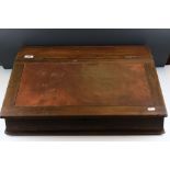Late 19th / Early 20th century Table Top Desk, the sloping writing surface opening ton a later