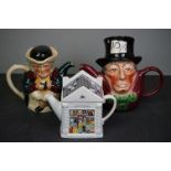 Three novelty teapots to include Mad Hatter, Woods Character and a Wade Antiques shop.