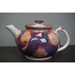 An Aldermaston pottery teapot by Alan Caiger Smith, signed to base.