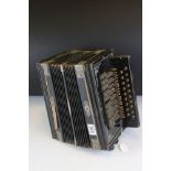 A vintage Chromatic Single steel read accordion.