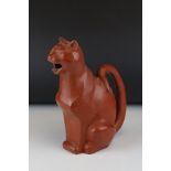 A terracotta pottery Art Deco style jug in the form of a cat, 28 cm tall.