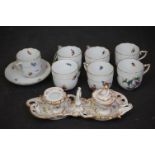 Seven Herend Porcelain Coffee Cups plus a Saucer decorated with Birds and Butterflies together