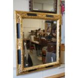 A painted bevelled edged antique style mirror.