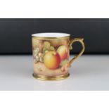 A contemporary Royal Worcester tankard with fruit and berry decoration signed D S Hinnie printed
